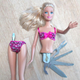 Image for article titled Make Barbie More Useful By Turning Her Into a Swiss Army Knife